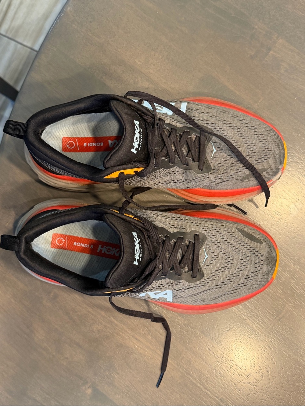 Hoka Bondi 8 Men's Gray Running Shoes with Orange Trim
